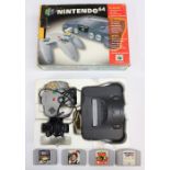 Nintendo: A boxed Nintendo 64, complete with four unboxed games: Pokemon Snap, World Cup 98, F-