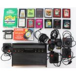 Atari: An Atari 2600 VCS console, with two paddles, four joysticks and adaptor; together with twelve