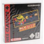 Nintendo: A boxed and sealed, Game Boy Advance, NES Classics, Pac-Man, with red Nintendo seal