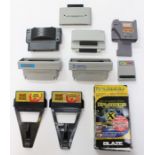 Video Games: A collection of ten assorted console 'cheat' cartridges, for SNES, NES, Gameboy and