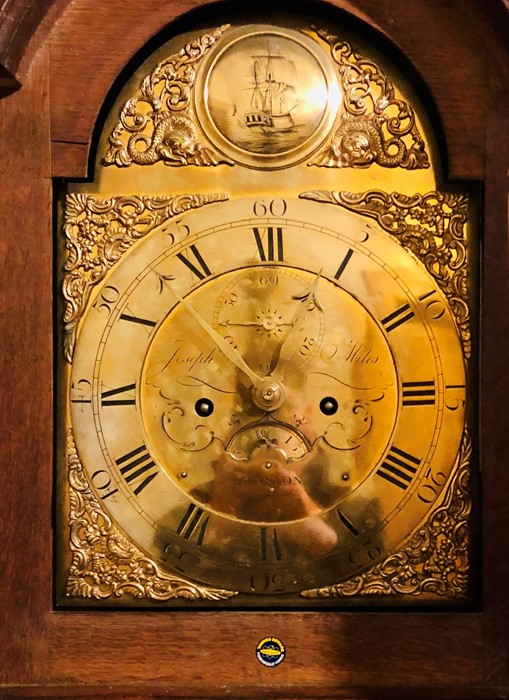 A George III oak crossbanded 8-day longcase clock, circa 1770, dental pediment above an arched brass - Image 2 of 4