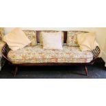 A 1950's Ercol design settee. 200cm W