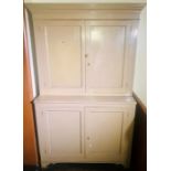 A later painted 19th Century pine country farmhouse kitchen cupboards, moulded cornice above two
