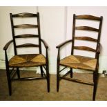 A pair of Arts & Craft Cotswold School ash ladder back chairs, circa 1900, curved back rails on a