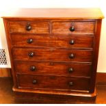 A Victorian mahogany chest of drawers, circa 1870 rectangular curved moulded edge front above two