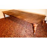 A Victorian mahogany extending dining table, circa 1860, rectangular moulded smooth edge top with