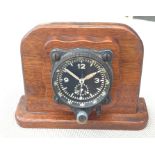 WW2 Third Reich Luftwaffe FL23885 Junghans Borduhr Cockpit clock set in Trench Art wooden plinth.