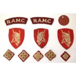 WW2 / 1950's British RAMC insignia group comprising of pair RAMC shoulder titles, 5 RAMC cloth BD