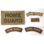 WW2 British Home Guard insignia group comprising of cut down uniform removed Home Guard brassard,