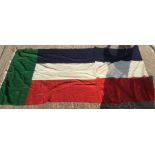 A large Boer War Vierkleur Flag. Size 152cm x 354cm. Maker marked to edge "JS Joubert". Has an old