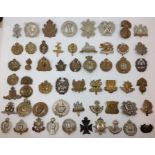 WW1/WW2 British cap badges. Over 50 in total to include WAAC, ATS, Borders, Leicesters, Buffs,