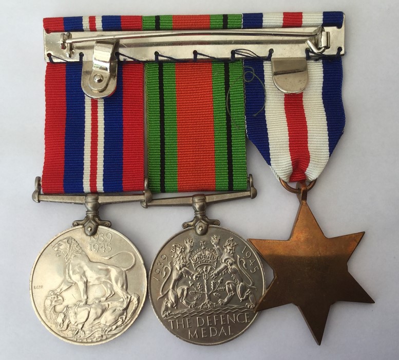 WW2 British France & Germany Star, Defence Medal and War Medal. All with ribbons mounted on a pin - Image 2 of 2