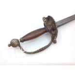 Court Sword with single edged fullered blade 810mm in length. No makers marks. Wooden grip. Guard is