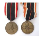 WW2 Third Reich Kriegsverdienstmedaille - War Merit Medal. Two examples both complete with full