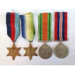 WW2 British 1939-45 Star, Atlantic Star, Defence and War Medal. Complete with ribbons.