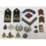 WW2 British cap badges and Canadian insignia to include North Staffs, RA, Gloucesters, Middlesex