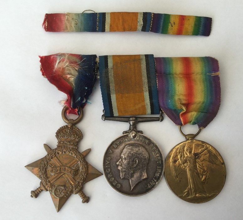 WW1 British 1914-15 Star, War Medal and Victory Medal to Pte M Fenn, Lincolnshire Regt. Mounted on a