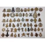 A collection of restrike WW1/WW2 British Army cap badges. Approx 60 in total to include Borders,