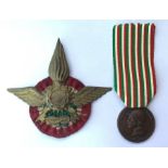 WW2 Fascist Italian Pith helmet cap badge and cockade and a WW1 Italian War of Unification Medal