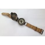 WW2 RAF Wrist Compass, complete with canvas strap. Marked on reverse No 11589/B.