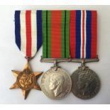 WW2 British France & Germany Star, Defence Medal and War Medal. All with ribbons mounted on a pin