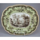 A mid-nineteenth century brown and white transfer-printed Herculaneum large platter, c.1830. It is
