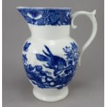 An early nineteenth century blue and white transfer printed Coalport jug, c.1800. It is decorated