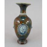 A late nineteenth century Doulton Lambeth small-size vase, c.1881. It is decorated with vignettes of