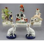 A group of late nineteenth century Staffordshire spill vases groups, c. 1860-1870 together with a