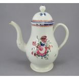 An early nineteenth century pearlware coffeepot, c.1800. It is hand-painted in colours with floral