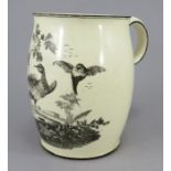 A late eighteenth century creamware black-printed silver-shape large tankard, c.1780. It is