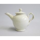 A miniature Leeds  Creamware Teapot and Cover. With a crossed strap handle, Date  Circa 1780,