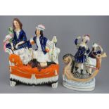 Two late nineteenth century Staffordshire figure groups, c. 1860-70. To include:  two figures