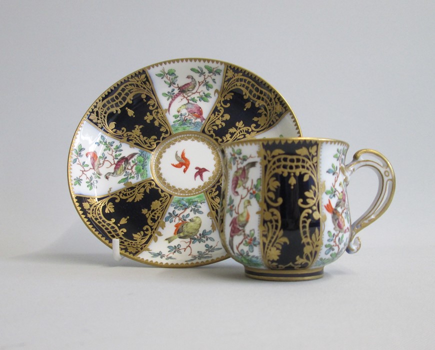 An English Porcelain Cup and Saucer Decorated with Exotic birds and cobalt blue panels with gilt - Image 2 of 6