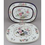 Two early nineteenth century transfer-printed and coloured iron stone china drainers, c. 1825. One