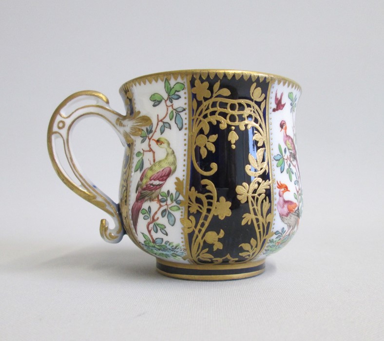 An English Porcelain Cup and Saucer Decorated with Exotic birds and cobalt blue panels with gilt - Image 3 of 6