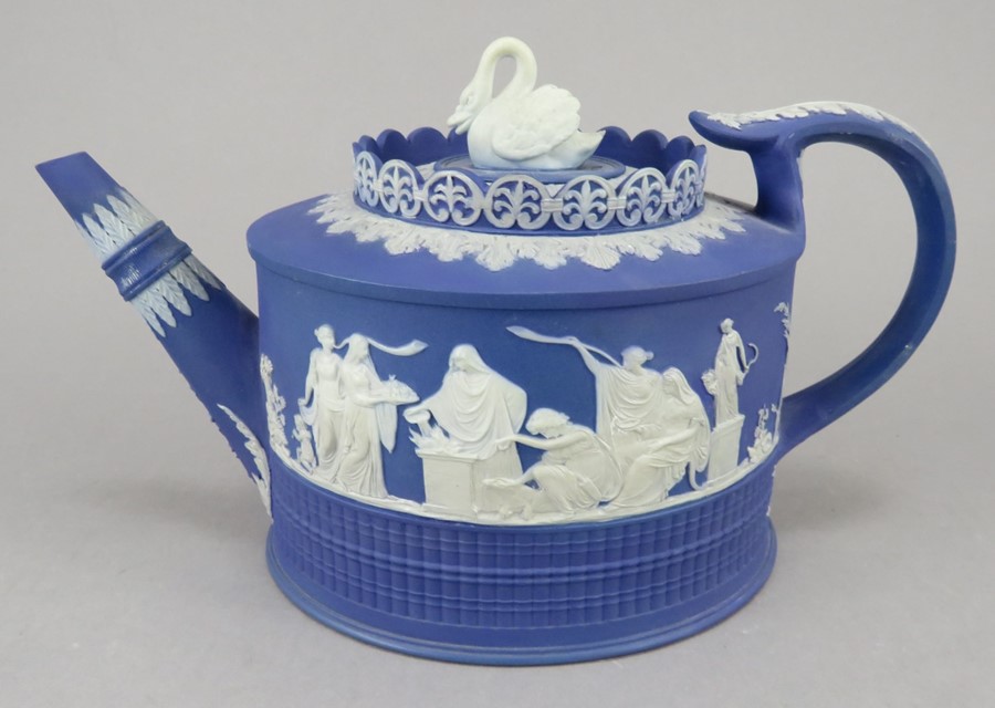 A late eighteenth century Adams (marked) jasper ware teapot and cover c.1785. It has a swan knop