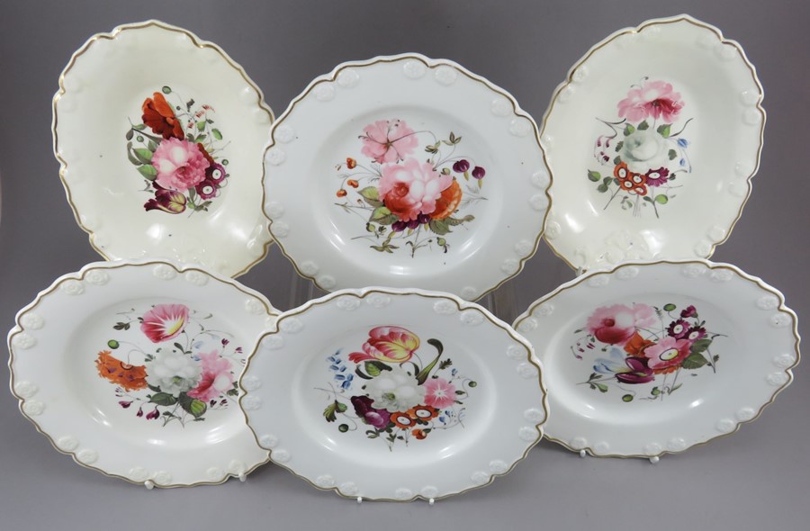 A group of early nineteenth century hand-painted porcelain moulded dessert plates and two single- - Image 2 of 3