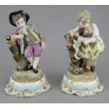 A pair of late nineteenth century Meissen style figures, c.1870. They depict and and a girl.