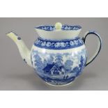 An early nineteenth century blue and white transfer-printed teapot and cover, c.1815-25. It is