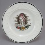 An early nineteenth century transfer-printed and moulded child's plate, c. 1830-40. It is printed in