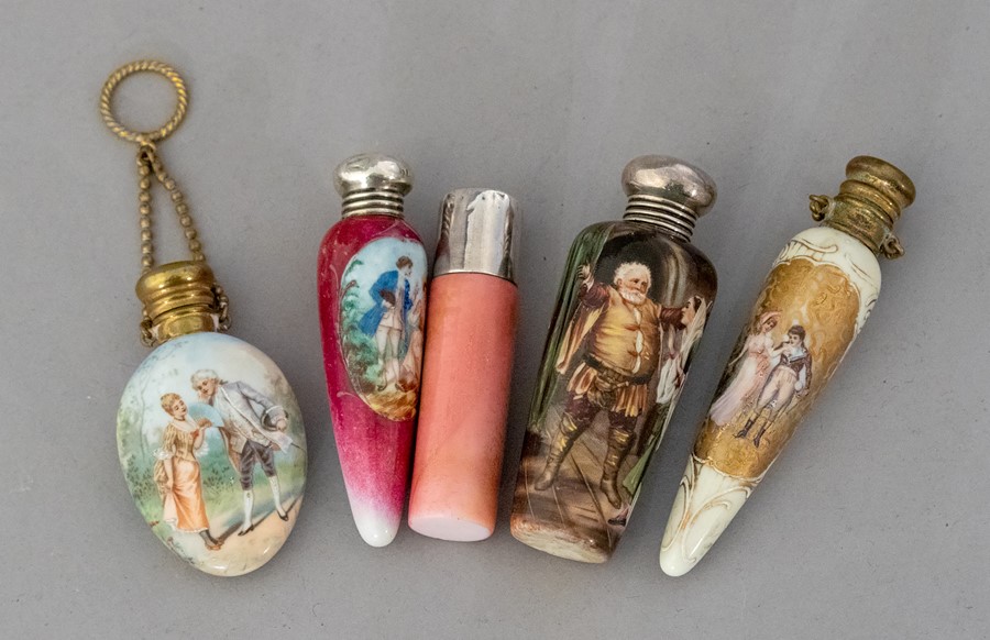 Five assorted late 19th Century porcelain scent bottles, to include four with transfer printed