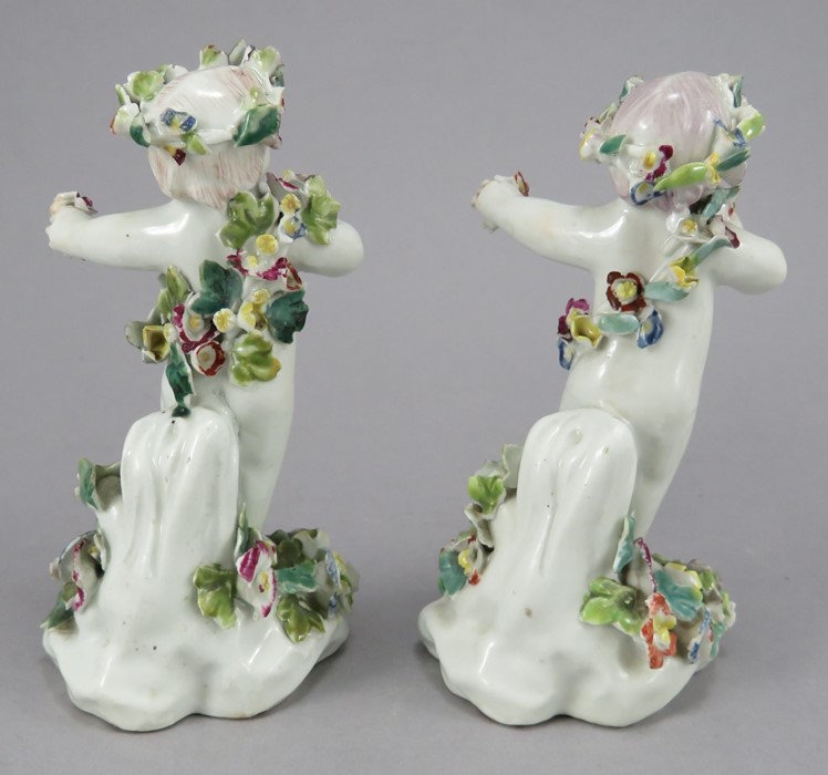 A pair of Derby porcelain cherub figures with encrusted flowers, all hand-painted, c. 1770. - Image 2 of 3