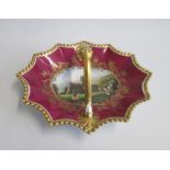 A Chamberlains & Co Worcester Sweetmeat Basket. Claret ground with gilded rim and handle. The centre