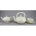 A Belleek first period three piece tea set, all moulded in the form of Echinus, c.1869. All marked