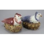 A pair of early nineteenth century sauce tureens on the form of a sitting pigeons, c. 1820. One is