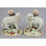 A pair of  handed William Kent spill vases in the form of sheep, c. 1900-20. They are both