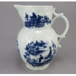 A late eighteenth century blue and white transfer-printed porcelain Caughley mask jug, c. 1795. It