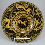 An early twentieth century Italian M F Faenza circular ceramic wall plaque, c. 1910. It is decorated