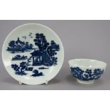 An eighteenth century blue and white transfer-printed porcelain Worcester tea bowl and saucer, c.